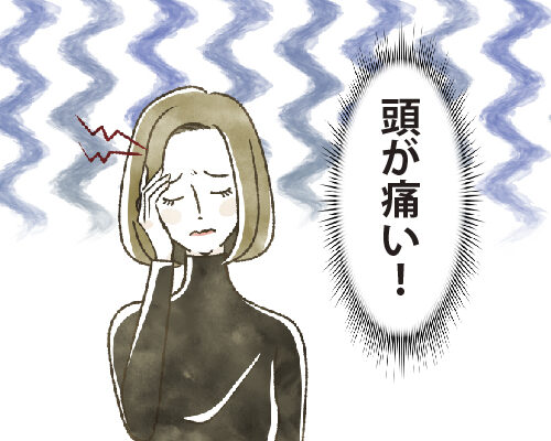 頭が痛い女性